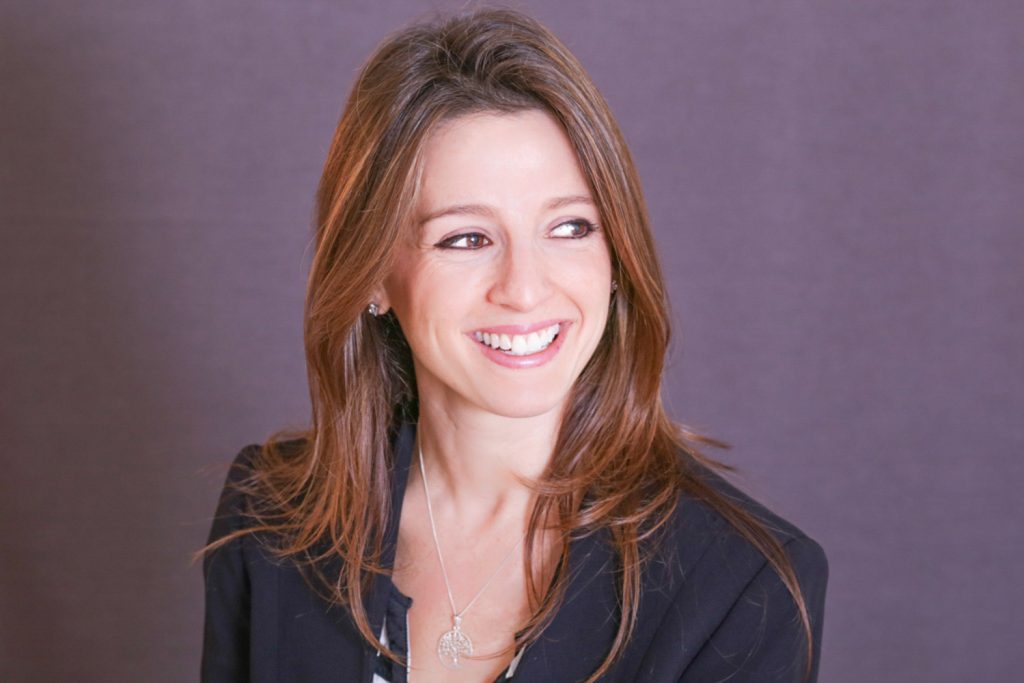 Lawyer smiling to someone in a suit