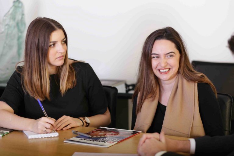 Corporate work colleagues at desk