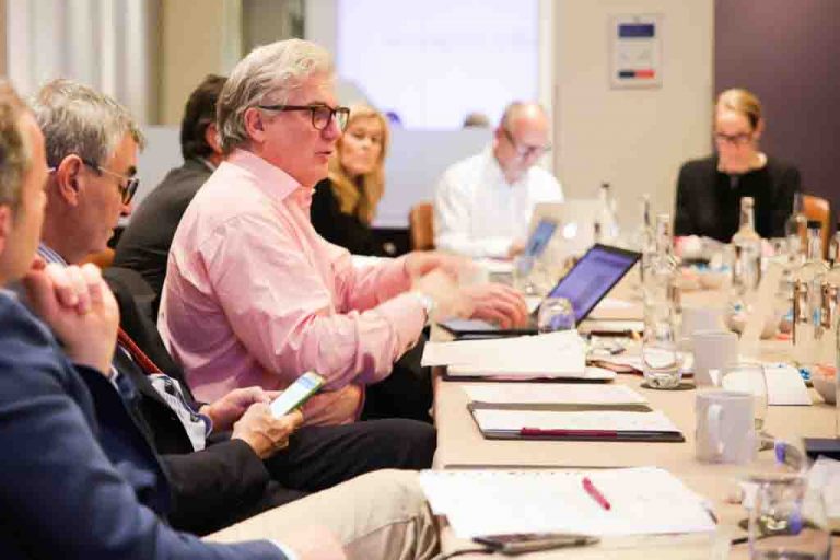 Corporate team around a desk
